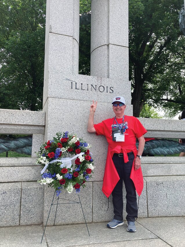 Jerry Howard holds up a &ldquo;V&rdquo; at the World War II Memorial, which he says stands for victory, veterans and value. It&rsquo;s a new thing he&rsquo;s doing.