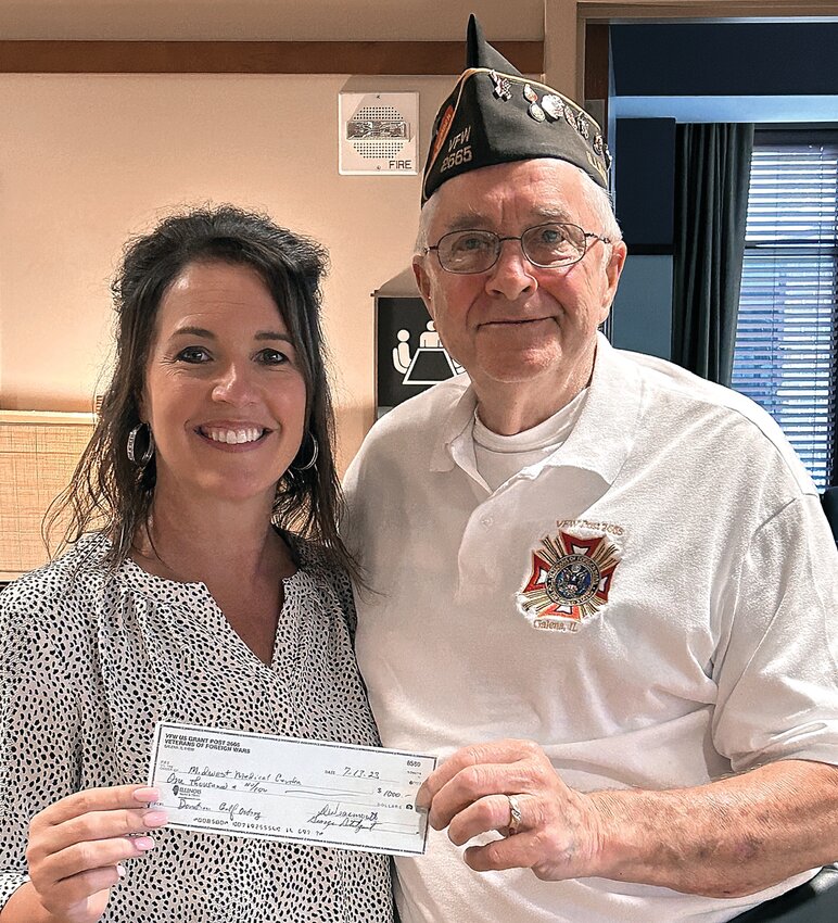 On Thursday, July 13, the VFW donated $1,000 to Midwest Medical Center to go towards their 13th annual Midwest Medical Center Golf Outing Fundraiser on Thursday, September 14. From left: Tracy Bauer (President/CEO of MMC) and Dick Wearmouth (Quartermaster).