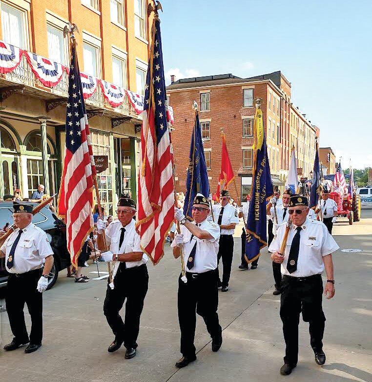The Guard at the recent Fourth of July Parade. From left: Mike Koeller, Dick Anderberg, Jerry Howard, Art Ricker.