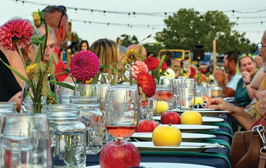 A farm-to-table event celebrating the Community Foundation was held on Saturday, Sept. 9. People had their meals, prepared by Life&rsquo;s A Fest, outside.