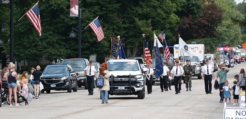 Led by area police departments&rsquo; mascot, the parade was comprised of the Color Guard, Vietnam Veterans, police and ambulance units, numerous floats, the River Ridge Marching Band and fire trucks from Hanover and Savanna.