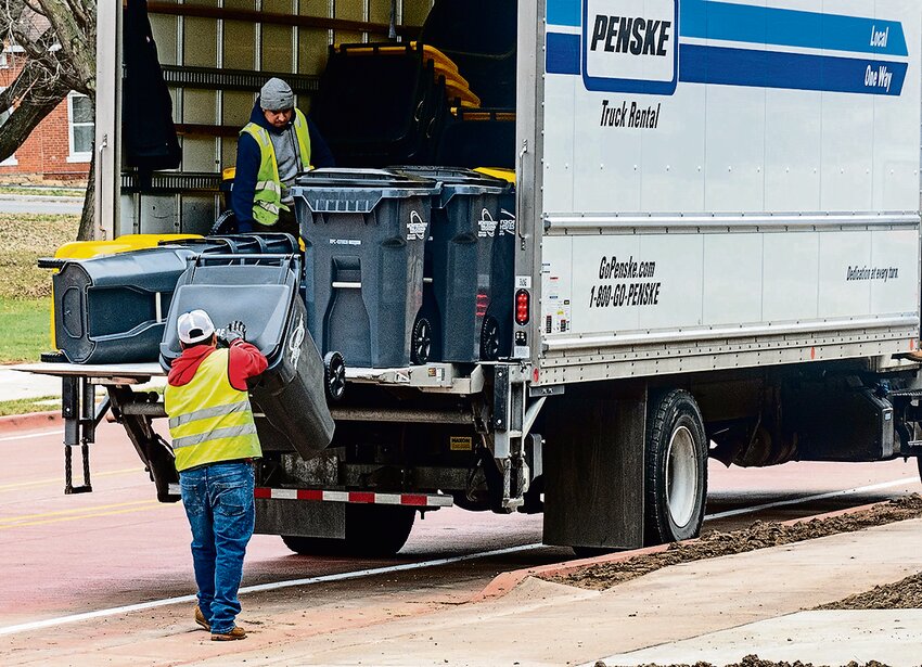 Workers from Montgomery Trucking began delivery of new trash cans on Dec. 14 to Galena residents.