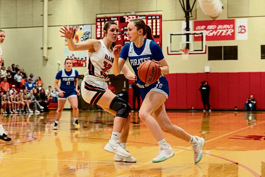Galena freshman, Leah Heller, takes an Illini Bluff off the dribble in the squads' supersectional battle on Feb. 26 in Brimfield, Ill.
