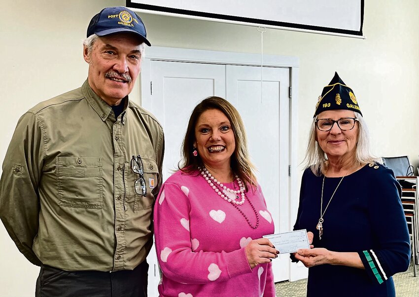 Pictured from left are Earl Slayton and Kiwanis President Stacy Bouldoukian, presenting a check to Valerie Slayton.