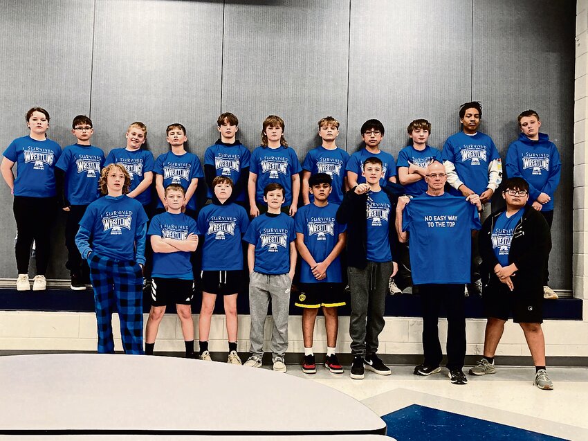 At their 2023-24 season celebration, the inaugural Galena Middle School wrestling team poses for a photo. Front row, left to right:  Elliot McIntyre, Ian Tancrell, Beckham Mariette, Hilo Thew, Bryan Garcia, Koa Thew, Coach Gary Webster, Jose Henandez-Garcia. Back row, left to right: Kaiya Weber, Grant Karberg, Coy Smith, Gabe Tancrell, Connor Higgins, Sawyer Wall-Penoyer, Chance Heard, Geo Luna Riveria, Cooper Hartlep, Kingston Walker, Nolan LuGrain. Not pictured: Jonah Pregler, Mayson Preglar, Irais Garcia, Coach Mike Campbell and Coach Chad Stenberg.