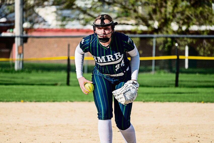 Staring down home plate, Laiken Haas, junior, selects a pitch in the Hornets&rsquo; matchup against the Galena Pirates on April 19.