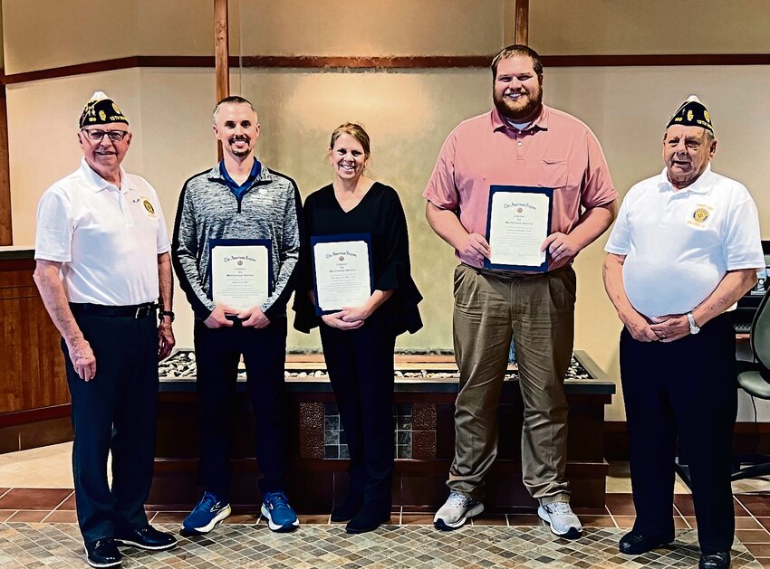 American Legion Post 193 Commander Jerry Howard and Chaplain Dale Wohlers presented Midwest Medical Center therapy staff Justin Glen, Julie Soat, and Andrew McFadden with certificates for meritorious service.