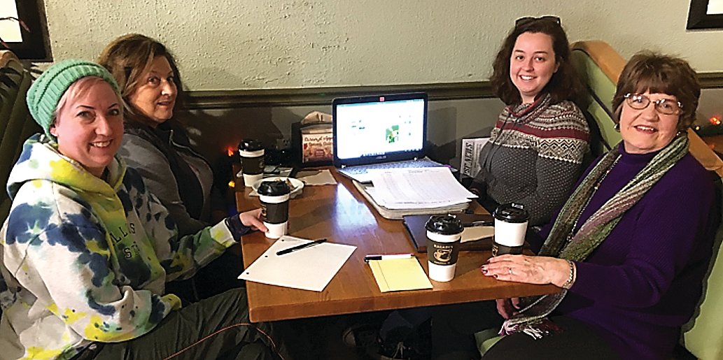 Padgham Larson shares the results of the trial run using her book and lesson plans with Galena students with Sue Cording (right foreground) and Irene Thraen-Borowski (left foreground), LWV-Jo Daviess County co-presidents, and Jean Norman, secretary, in January 2020.