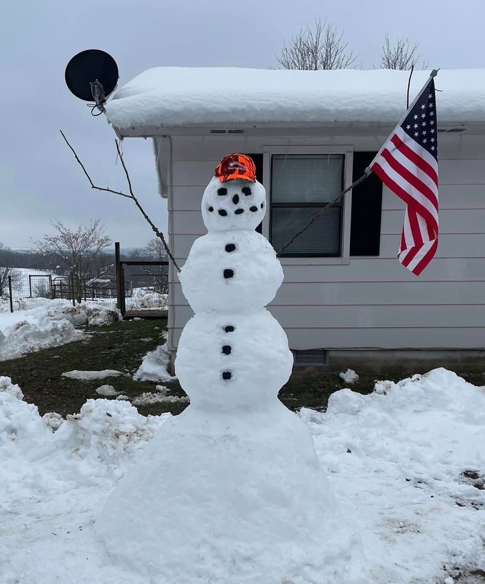 Robert and Kim Humphries of Everton built a patriotic snowman during the snowstorm Wednesday, Jan. 25.