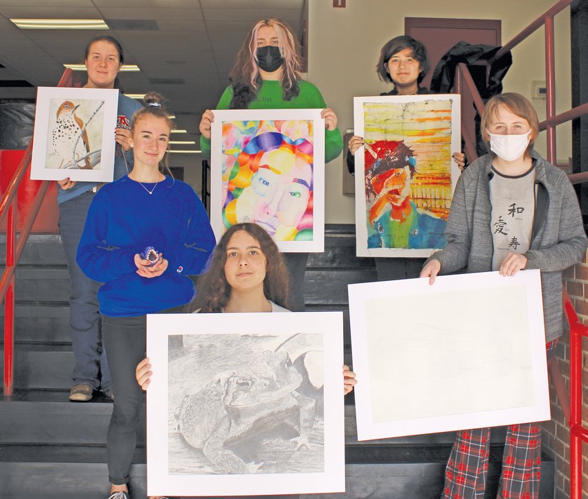 Flippin Middle School students (front, from left) Clayton Griffin and Kaitlyn Smith (back) Sarah Peterson and Grace Johnson have works of art competing in the Wildlife Forever, National Songbird Contest held in White Bear, Minnesota.