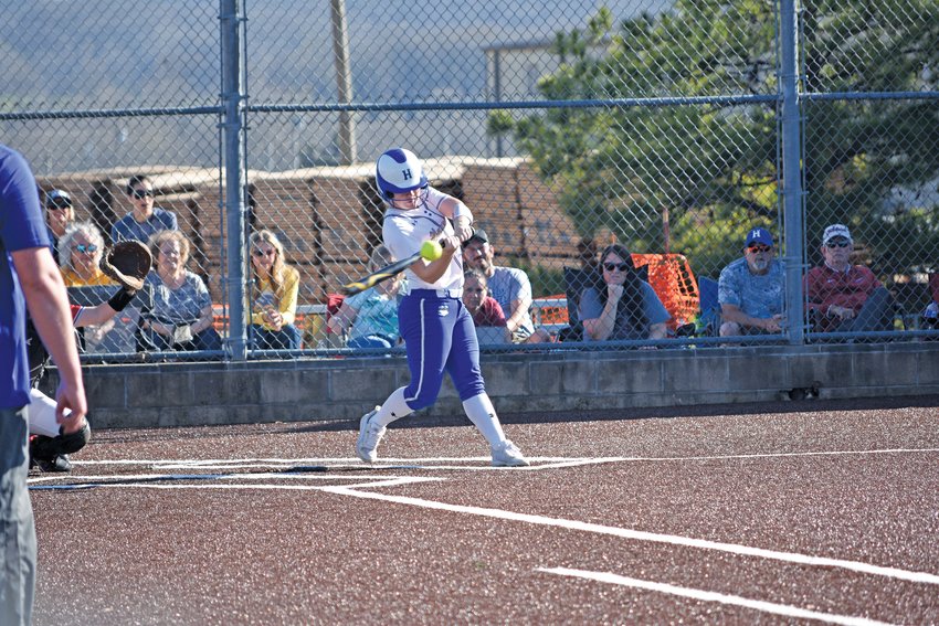 Harrison&rsquo;s Kaylee Wolfe connects with a pitch during a conference game this season at Cavender&rsquo;s Field. The Lady Goblins played Farmington on Thursday and finished with their first ever win over the Lady Cardinals by a 3-2 score.