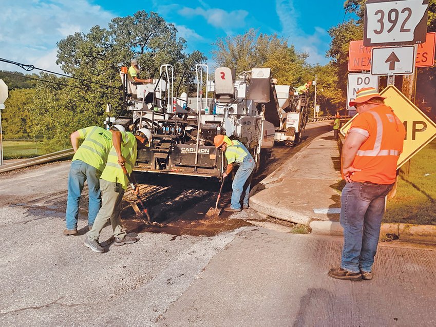 Paving on Capps Road began Monday morning at the five-way stop on Maple Street. The road overlay project for the Arkansas Department of Transportation is being done by the Marion County Paving Company and APAC.