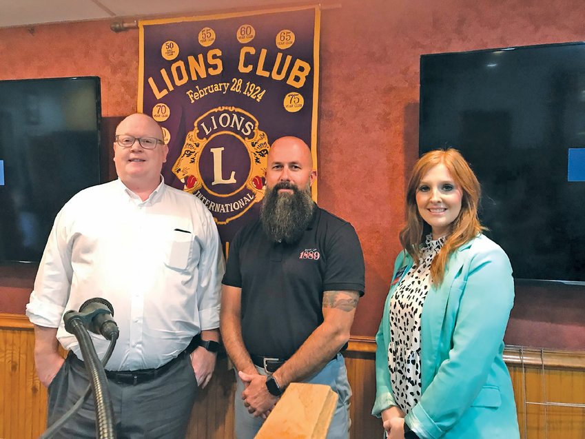 The Harrison Noon Lions club inducted new members (from left) Aldon Taylor, Joe Don Sharp and Anika Palmer.