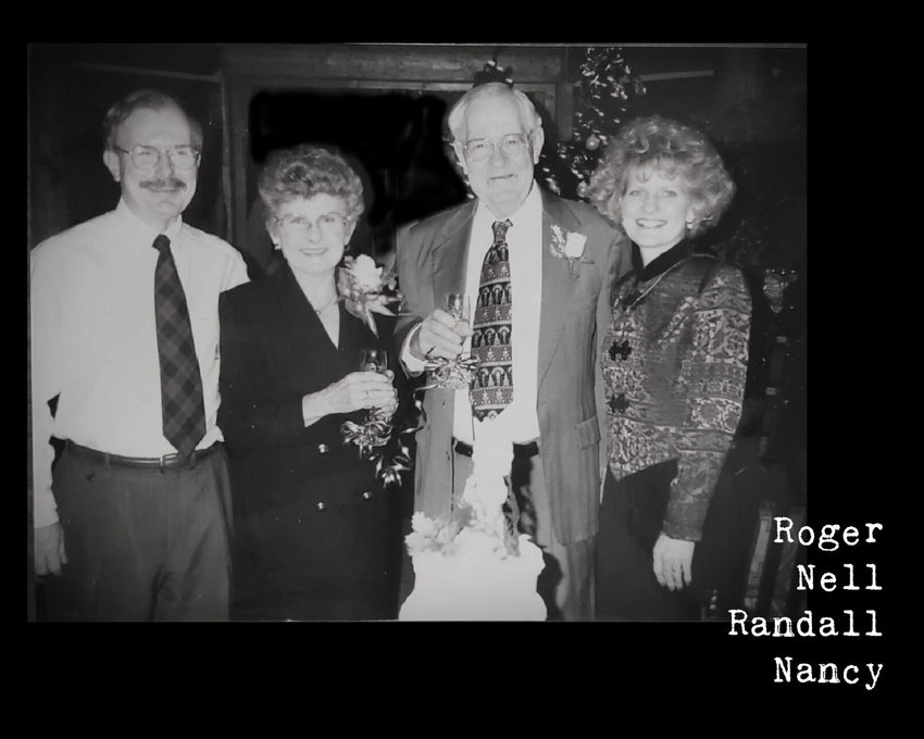 1.7 Randall &amp;amp; Nell   CONTRIBUTED PHOTO   Parents (center) Randall and Nell Earnest began selling insurance in 1971. Children Roger (left) and Nancy Dodson (right) also worked at the company as the second generation. Roger and Nancy started working in the office in the 70s and Roger became an agent in 1976. Nancy worked in the office for 24 years.