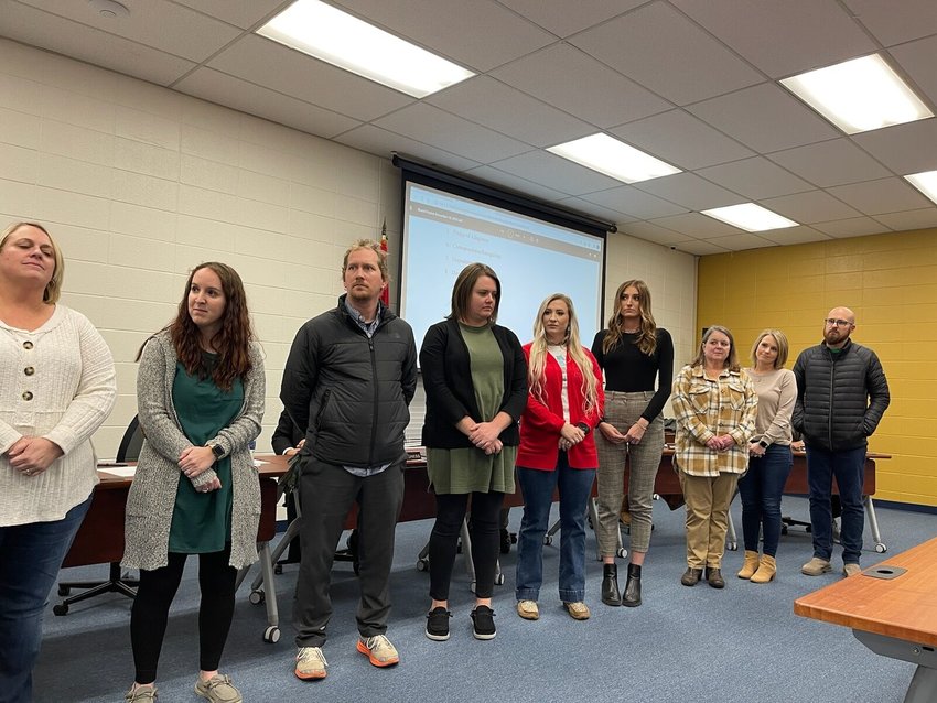 Members of the Middle School Guiding Coalition attended the School Board meeting where it was announced the Middle School received $82,000 in reward and recognition money for high student performance. DONNA BRAYMER/STAFF