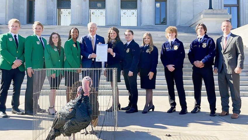 Governor pardons turkeys   CONTRIBUTED PHOTO   Governor Asa Hutchinson issued two pardons last week to Randy and George who will continue to live out their days with Jackson Barber, FFA and 4-H student from Cabot. Other 4-H students were on hand for the special occasion.
