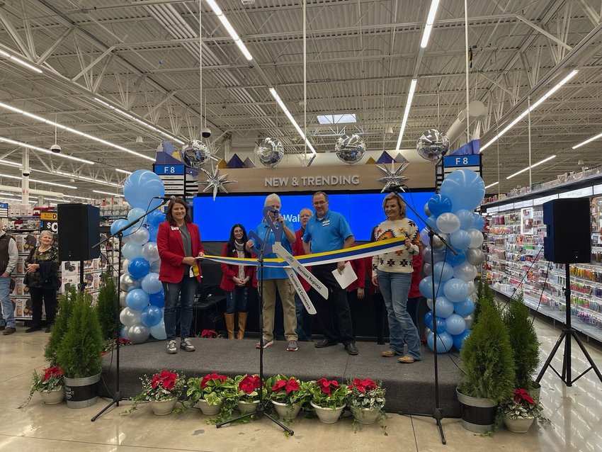 Ribbon Cutting   Donna Braymer/Staff&nbsp;&nbsp;&nbsp;   Store manager, Mike Murphy asked associate Wynona Bryant who has worked for Walmart for 42 years to be a part of the ribbon cutting ceremony with the Harrison Regional Chamber of Commerce ambassadors.