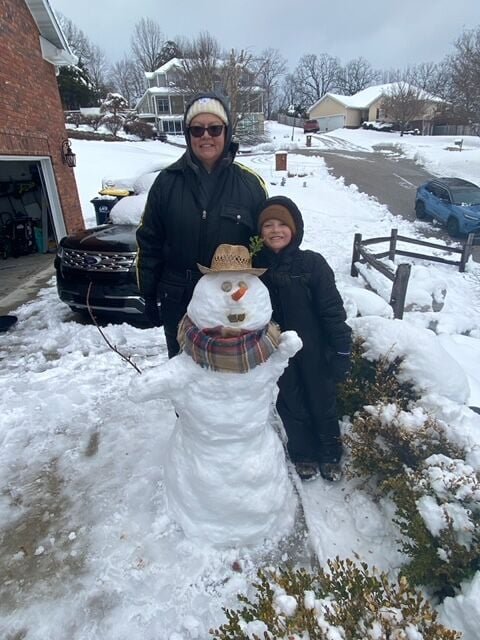 CONTRIBUTED PHOTO   Shannon Payne with grandson Paxton Hamilton have some fun in the snow. Paxton, age 8 is a second grader at Skyline
