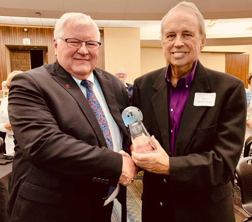 Mike Masterson (right) received the 2023 Ozarks Ambassador Award presented by the North Arkansas College Foundation from Northark President Rick Massengale. Masterson was honored Tuesday night, April 4, during the Foundation&rsquo;s annual Evening on the Plaza Dinner in Signature Bank Room at the Signature Bank Tower in downtown Harrison. Established in 1990, the Ozarks Ambassador Award is presented annually to someone who has represented northern Arkansas with distinction nationwide in one or more of the following fields: agriculture, finance, medicine, education, the arts, politics, law, business, social services, the ministry or industry. Masterson began his long journalism career after completing college at the University of Central Arkansas in 1971 and became the editor of the Newport Daily Independent. After two years, he became editor of the Hot Springs Sentinel-Record until 1980, when he joined the reporting staff at the Los Angeles Times. He has worked for major newspapers as a investigative reporter for many years. He now writes columns three times a week for the Arkansas Democrat-Gazette and lives in Harrison.