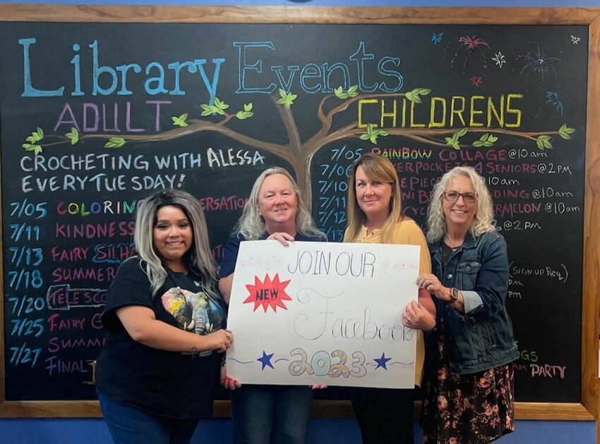 The staff at the Boone County Library (from left) Amy Griffith, Terry Register, Kelly Hardy and Ginger Schoenenberger are always finding ways to make reading fun. CONTRIBUTED PHOTO