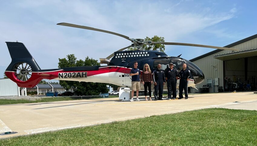 Members of the Mountain Home&rsquo;s Air Evac Lifeteam 12 pose in front of its new Airbus EC-130 helicopter which joined the fleet in July. Pictured are: mechanic Barry Holland; Program Director Lacey Robb, ASN, RN, CEN, NREMT; pilot Clarence Carldwell;&nbsp;RN Stephen Dunn; and flight medic Nathan Boone.   Helen Mansfield/The Baxter Bulletin