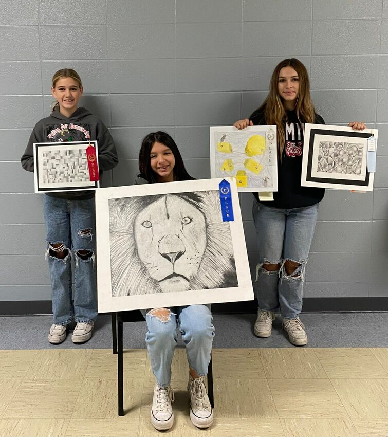 The Palette Art League Fall Festival Art Show winners from Flippin Middle School are (from left) Claire Ross, Alayna Baldridbe and Nikosia Rascon. CONTRIBUTED PHOTO