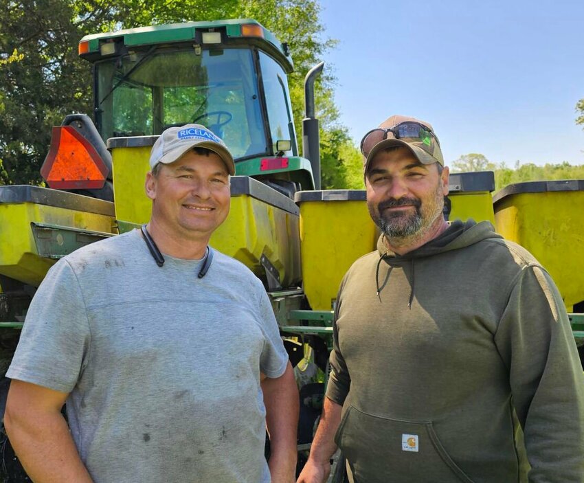 Greg Hart, right, and his brother Todd, left. The two farm as Hart &amp;amp; Sons Farm LLC, in Conway County, Arkansas. CONTRIBUTED PHOTO