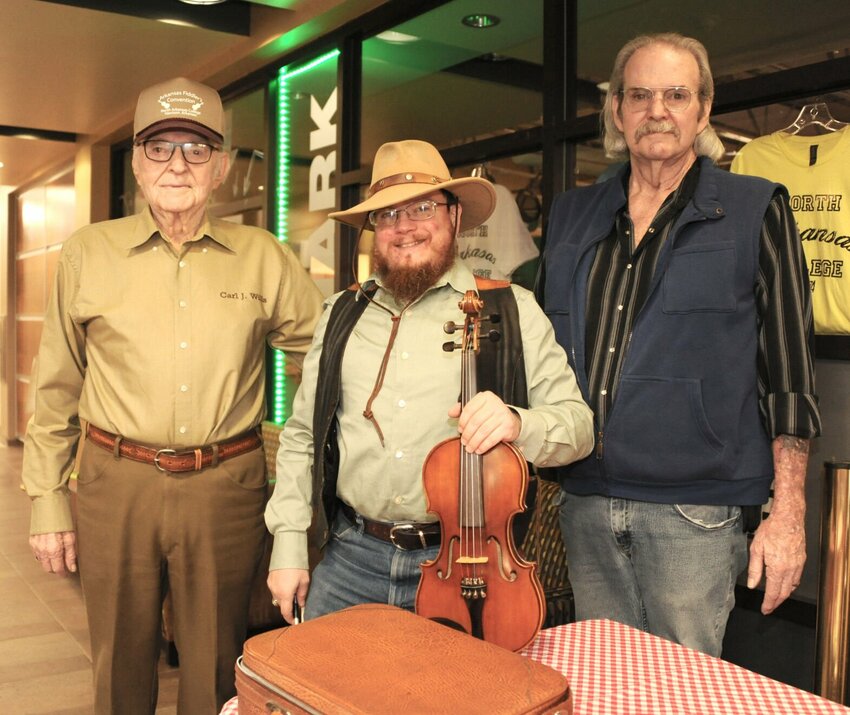 Carl J. Willis (left), president of the Arkansas Fiddlers Convention; Clayton Braswell, a local performer; and Bob Willis a vice-president of the Arkansas Fiddlers Convention. CONTRIBUTED PHOTO / LEE H. DUNLAP