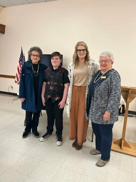 President Mary Speice (left), Miles Bright, Andrea Goulet, and Linda Mathis. An informative program on Monarch Butterfly conservation efforts was given by Andrea Goulet and Harrison Middle School student, Miles Bright at the March meeting of the Twentieth Century Club. CONTRIBUTED PHOTO