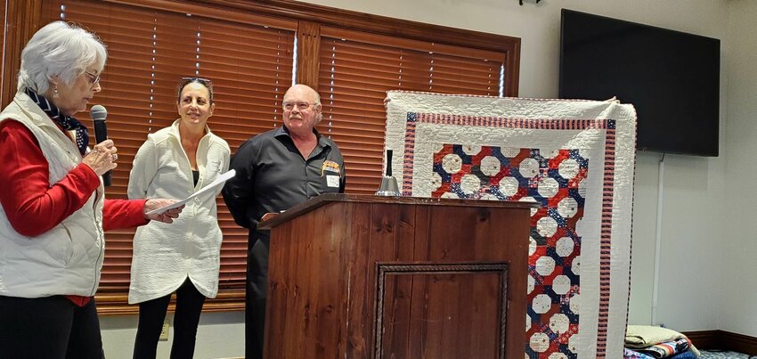 Quilts of Valor of the Ozarks holds their first ceremony, awarding a quilt to Veteran Richard Collins. From Left: Betty Thomas, co-leader of QOVO, Sandra Collins, wife of Richard Collins and honored Veteran Richard Collins. CONTRIBUTED PHOTO