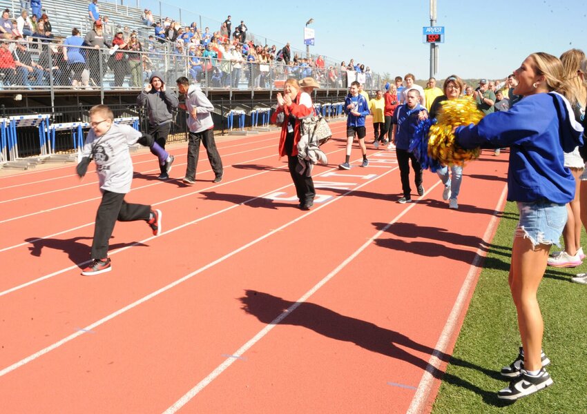 Special Olympics Athletes participate in Arkansas Area 2 Track and Field competitions at F.S. Garrison Stadium in Harrison on Friday, April 12. CONTRIBUTED PHOTO / LEE H. DUNLAP
