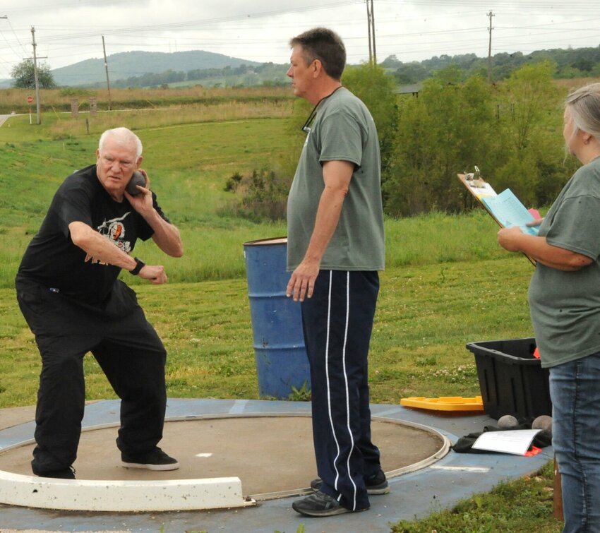 James Grant (age 78) of Marion County takes part in the Shot Put event at the Senior Games held Friday at F.S. Garrison Stadium.