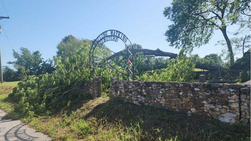The Freeling Watkins Cemetery on Bellefonte Road had a tree fall onto the graves. The Sunday morning EF-3 Tornado began on Bellefonte Road and cut a 21.1 mile path of destruction while killing one in Boone County and two in Marion County. JEFF BRASEL / STAFF