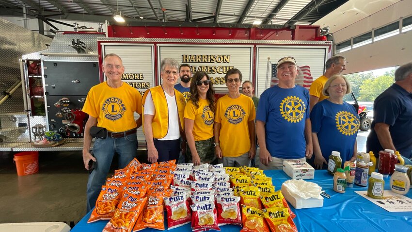 Members of local service organizations gather on Wednesday, Sept. 11 to provide a show of gratitude to local first responders. Members of the Harrison Lions Club, Kiwanis, and Rotary, along with many others worked together to hold the successful event — the first such 9/11 lunch to be held. LORETTA KNIEFF / STAFF