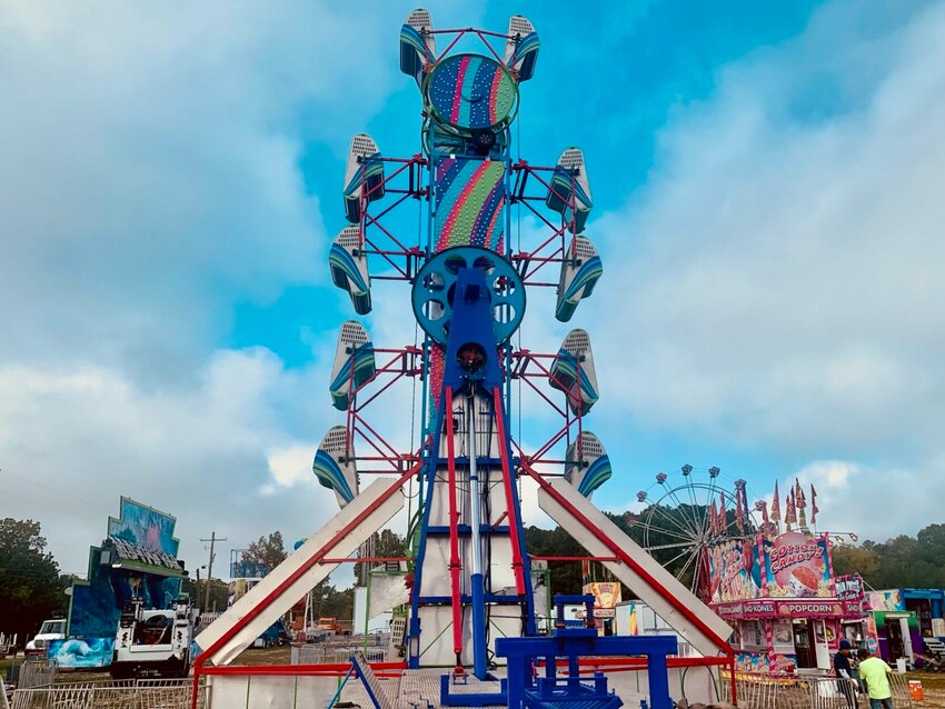 Carnival rides were being erected on Tuesday morning as the Northwest Arkansas District Fair is getting into full swing this week. CONTRIBUITED PHOTO / LEE H. DUNLAP