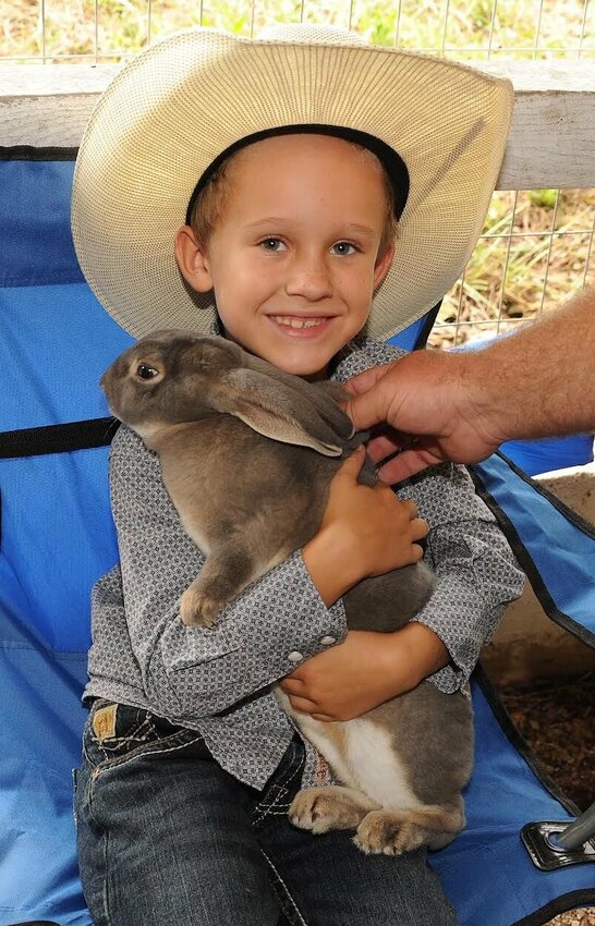 CONTRIBUTED PHOTO/LEE H. DUNLAP


Bo Dixon (age 6) shows his Rex breed rabbit named 