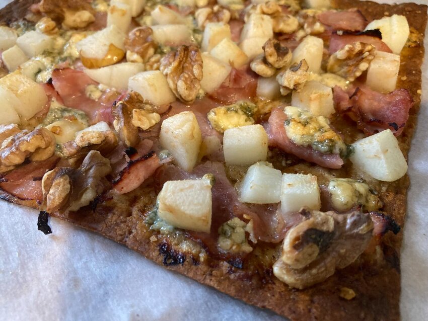 Diced fresh pears add a pop of sweetness to Pear & Gorgonzola Flatbread Pizzas. CONTRIBUTED PHOTO / LINDA MASTERS


 