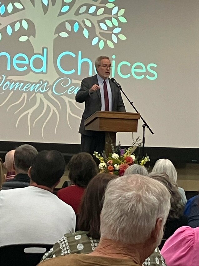 ZACH HOLT/STAFF


Dr. Marc Newman speaks at the Informed Choices Women's Center annual banquet Tuesday evening. Newman is an author and the president of Speaker of Life.