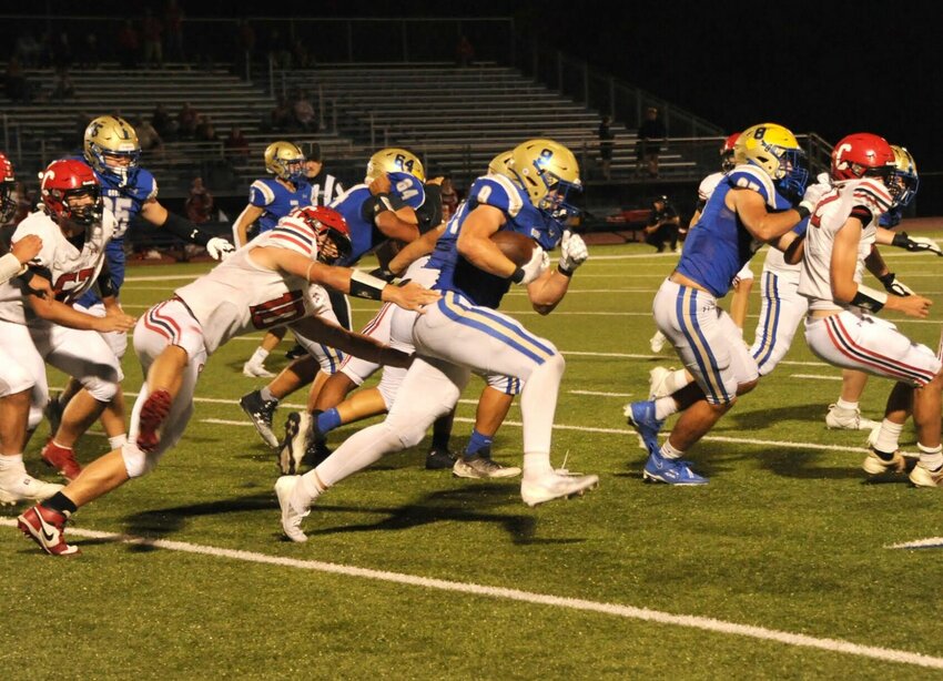 CONTRIBUTED PHOTO/LEE H. DUNLAP


Harrison sophomore Sky Lee punishes Clarksville defensive players during action on homecoming Friday night. Harrison defeated the Panthers, 42-0, for their first 5A-West win of the season.