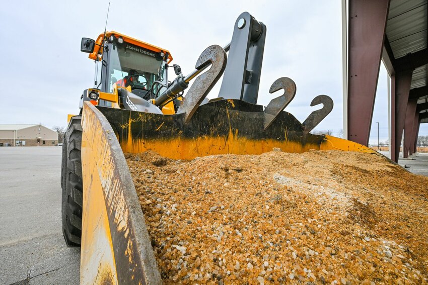 An ARDOT front-end loader filled with beet juice-treated salt. CONTRIBUTED PHOTO