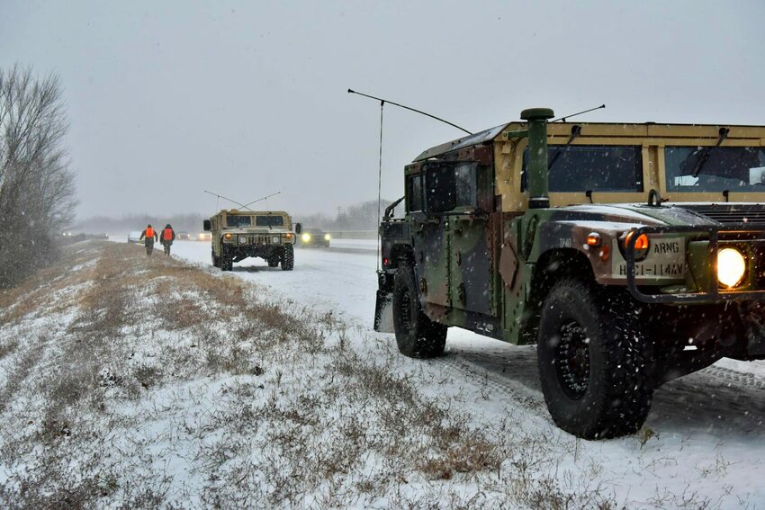 Humvees assist the Arkansas National Guard on their mission to support other agencies in the state on dangerous roads last year, in January 2024. The Arkansas National Guard will be out supporting road safety again this year. CONTRIBUTED PHOTO