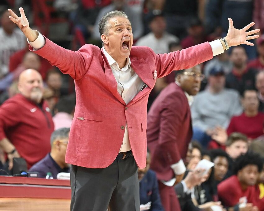 CRAVEN WHITLOW/NATE ALLEN SPORTS SERVICE   Razorback head basketball coach John Calipari shows his frustration to a referees call during their game against Alabama inside Bud Walton Arena in Fayetteville. Coach Cal will face South Carolina in the SEC tournament.