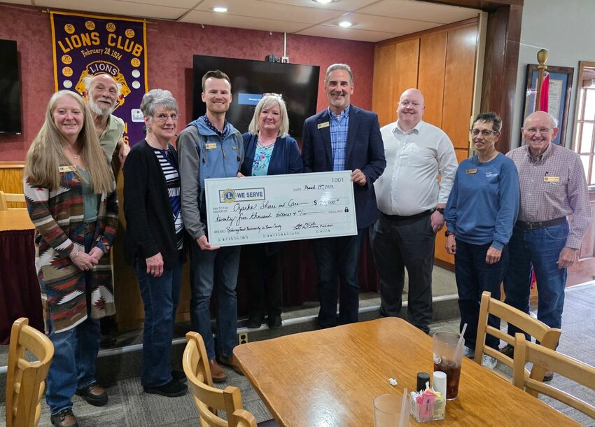 Representatives of the Lions Club Foundation present Share &amp; Care Executive Director Holly Carson with a $25,000 check. From left: Lion Erin Richardson, Lion Peter DeStefano, Lion Lou Ann Sutton, Lion Wilson Marseilles, Holly Carson, Lion John Marseilles, Lion Aldon Taylor, President Lion Judy McCutcheon, Lion Charles Adair CONTRIBUTED PHOTO