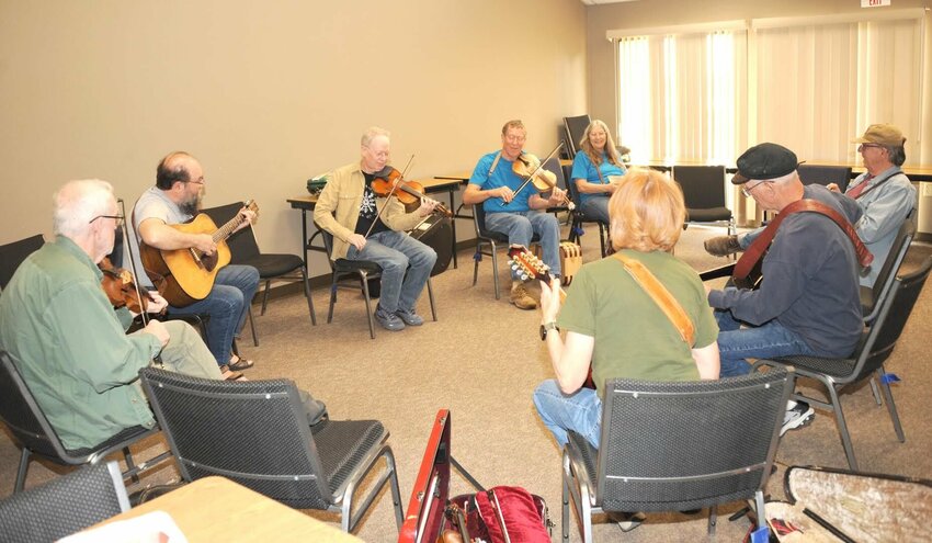 A jam session takes place at the annual Arkansas Fiddlers Convention.&nbsp;CONTRIBUTED PHOTO / LEE H. DUNLAP