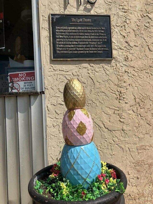 ZACH HOLT/STAFF   Easter egg decorations adorn the outside of the Lyric Theatre on the Square in Downtown Harrison.