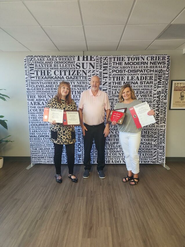 The Daily Times garnered several advertising awards at the annual Arkansas Press Association Advertising Conference. Brittany Vandegrift (from left), Jeff Brasel and Sheri Keeton represented the newspaper in the meeting.