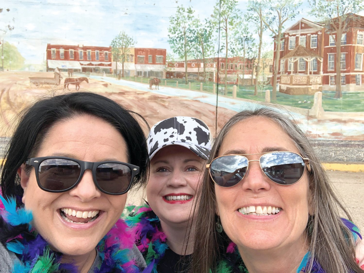 The winners of the JA Selfie Tour are team Heartland Eye Clinic (from left) Brandy Stewart, Serena Diffey, and Dina Paine. Teams searched for clues and took selfies at each checkpoint. The event was sponsored by KHOZ, Woods Disk Golf, Jake Gray from State Farm and Super Smiles Dentistry.