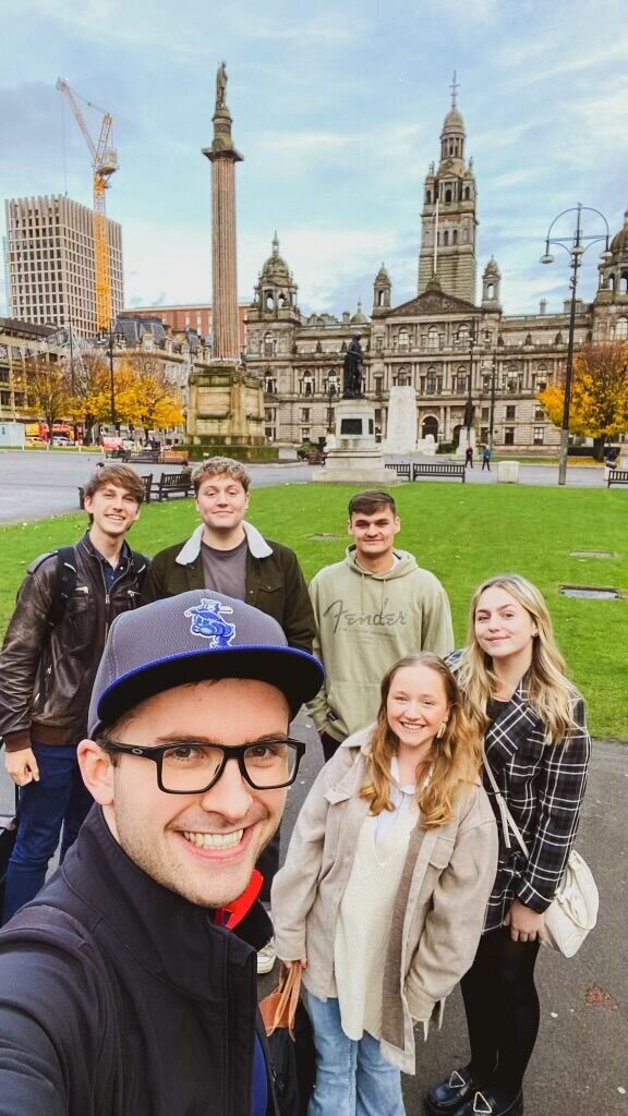 Jordan Whitmer, founder of the HowToLife Movement to reach Gen Z with the gospel, poses for a selfie with a local team preparing for an event in Glasgow, Scotland.


 
