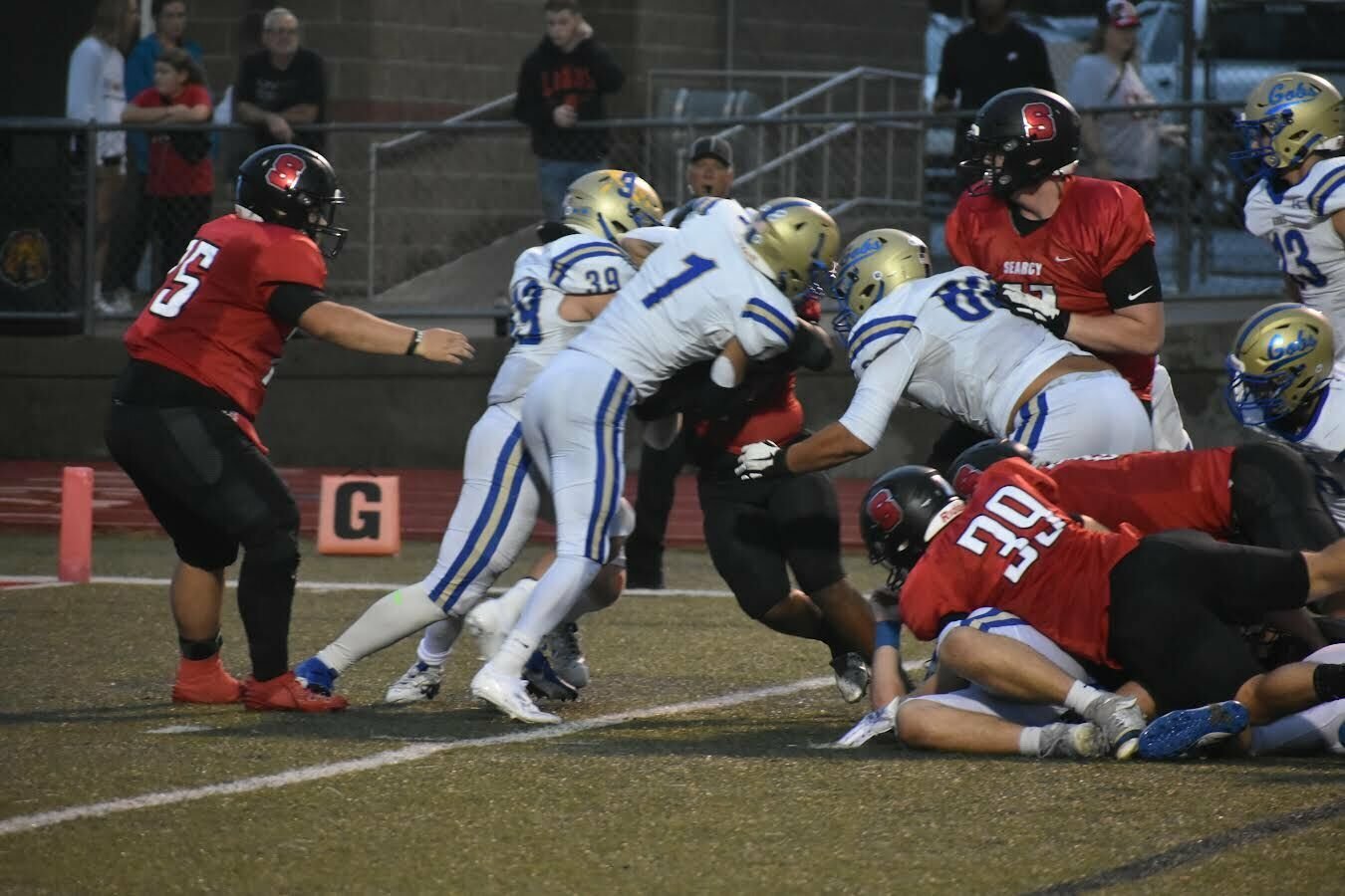 JEFF BRASEL/STAFF


Harrison's defensive players Caydem Long (from left), Jon Bartlett and Jacob Massey work together to bring down a Searcy player on Friday night. The Goblins have a week off before beginning 5A-West play next week.