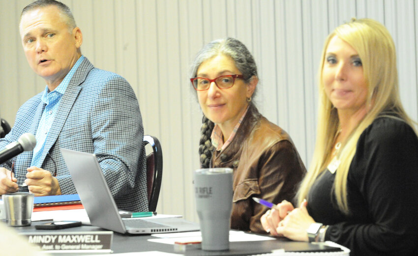 General manager Kelly Hale, above, introduces, from left, new administrative assistant Julie White. Mindy Maxwell, who held the position, is now the business development and client relations manager. (Lewis Delavan photo)